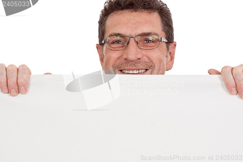 Image of mature smiling businessman holding billboard copyspace isolated