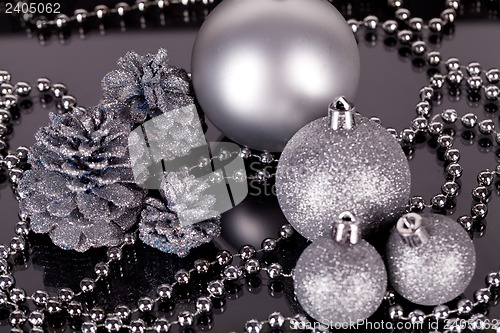 Image of christmas decoration in silver on black