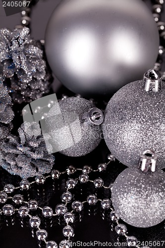 Image of christmas decoration in silver on black