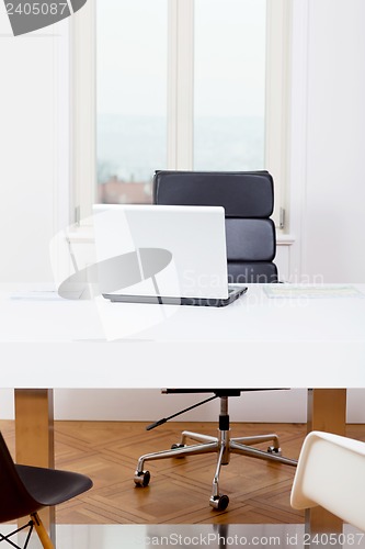 Image of office workplace table and laptop white background architecture