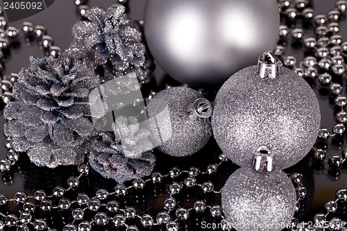 Image of christmas decoration in silver on black