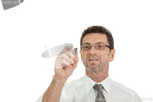 Image of smiling adult businessman write with red pen isolated copyspace