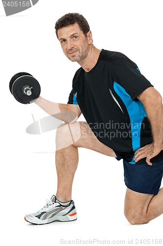 Image of adult attractive man with iron dumbbell isolated