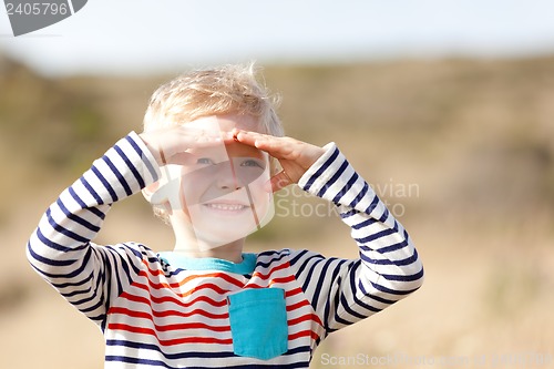 Image of happy boy outdoors