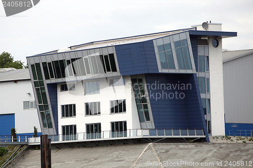 Image of Three-floor building with modern architecture