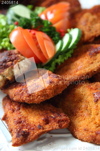 Image of Crumbed meat on a buffet table