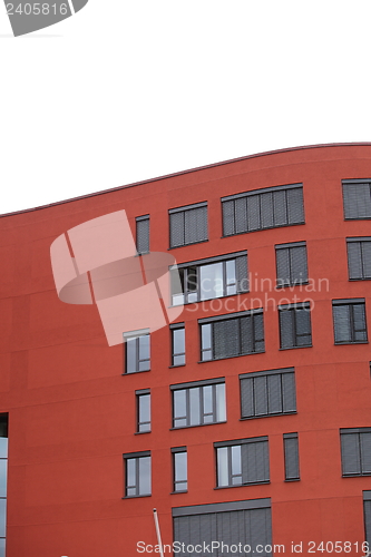 Image of Exterior of a red building with windows