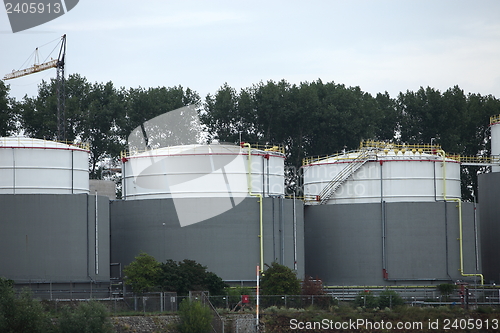 Image of Three industrial storage tanks