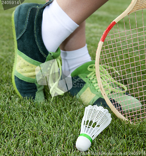 Image of foot of sportswoman on grass