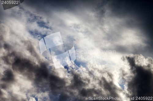 Image of Sky with sunlight and dark clouds