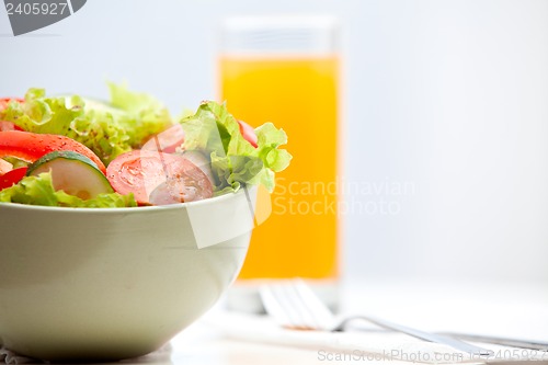 Image of vegetable salad with juice