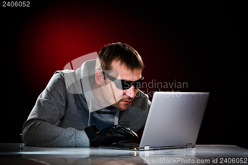 Image of Hacker with laptop