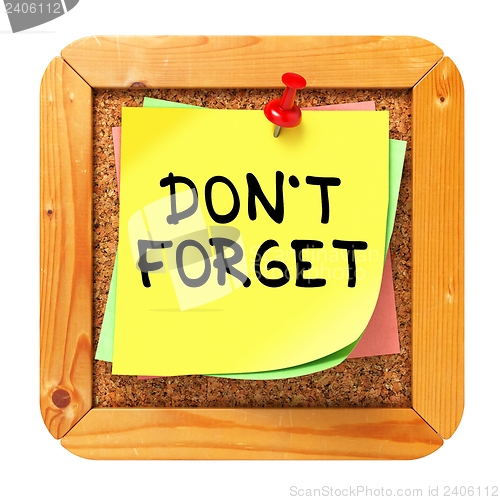 Image of Do Not Forget. Yellow Sticker on Bulletin.