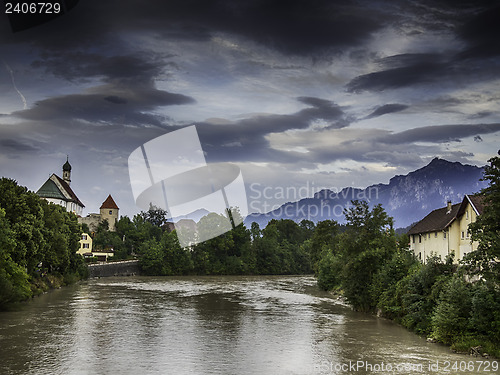 Image of River Lech in Fussen with historic church and alps