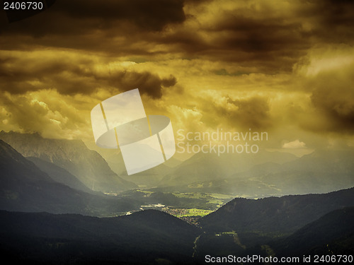 Image of View from Herzogstand to dark storm clouds