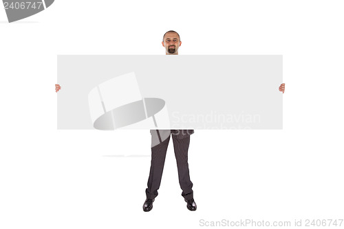 Image of Smiling businessman holding a really big blank card