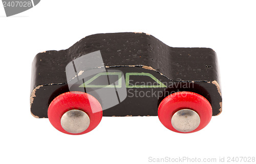 Image of wooden black vintage toy car model isolated white 