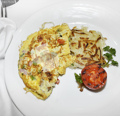 Image of Omelet With Vegetables And Bacon