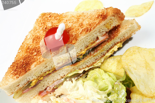 Image of Club sandwich with salad