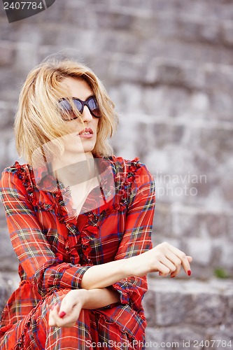 Image of Beautiful girl in a red dress