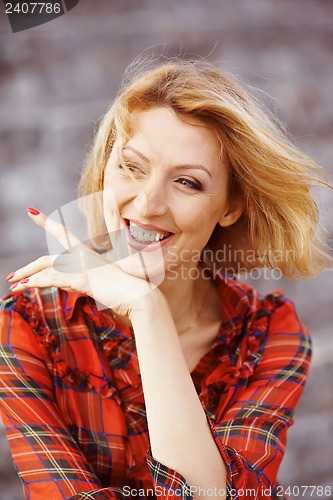 Image of Beautiful girl in a red dress