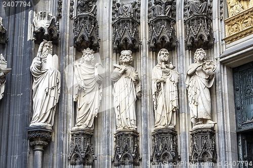 Image of Statues of saints on entry in medieval cathedral in Koeln