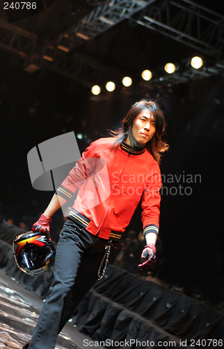 Image of Asian male model on the catwalk