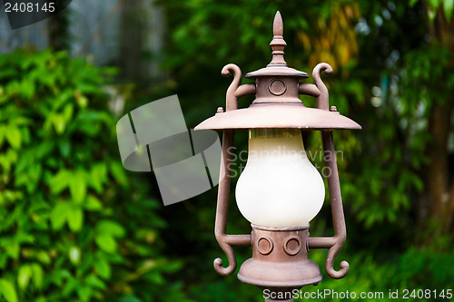 Image of Street lamp in the green garden