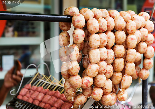 Image of Thai style grilled sausage on street market in thailand