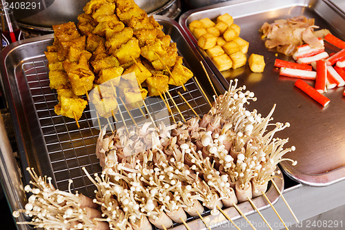 Image of Thai style grilled food on market