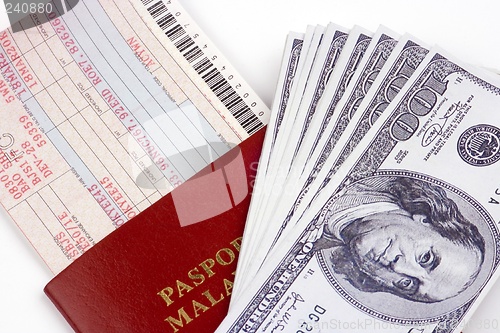 Image of Airline Ticket And Money