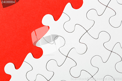 Image of Incomplete puzzle in red color