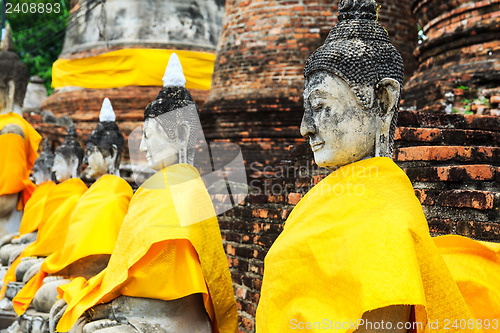 Image of Ancient Buddha in a row