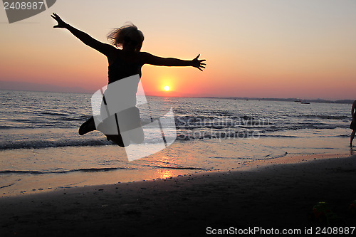 Image of Jumping in the Sunset