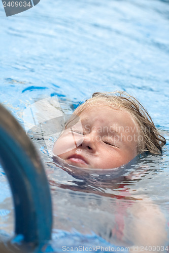 Image of little girl in swimming pool