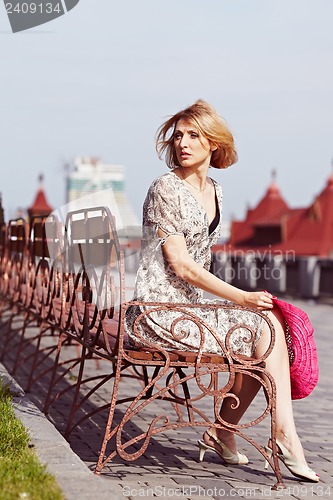 Image of Girl with red elements of clothing