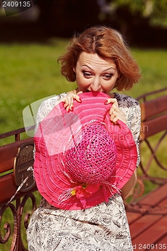 Image of Girl with red elements of clothing