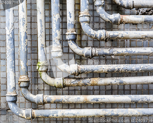 Image of Old pipes on wall