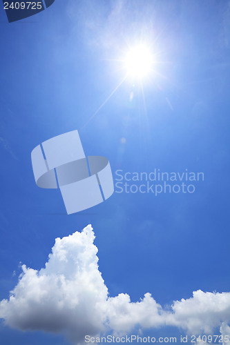Image of Blue sky with clouds and sun