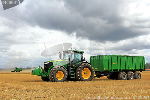 Image of John Deere Tractor and Combine Harvesting