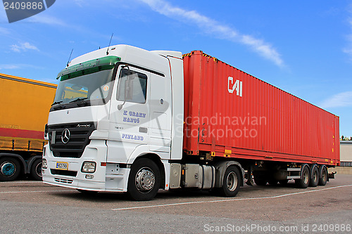 Image of White Mercedes-Benz Actros Truck and Trailer