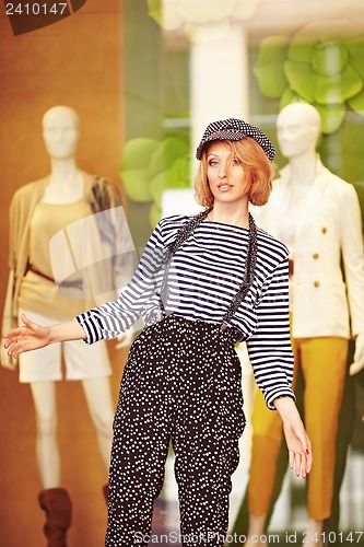 Image of Beautiful girl in the striped vest