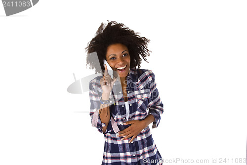 Image of Young african american woman on cellphone