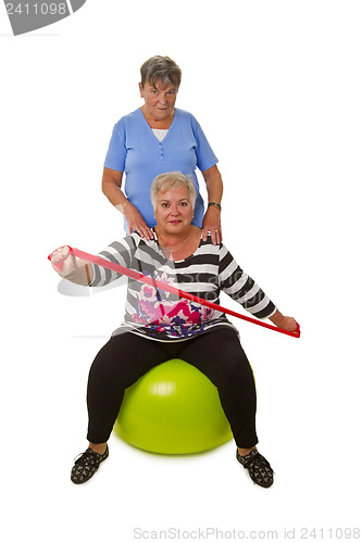 Image of  Two female senior woman exercises