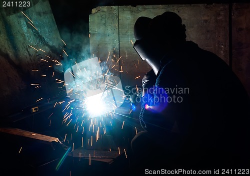 Image of skilled working factory welder