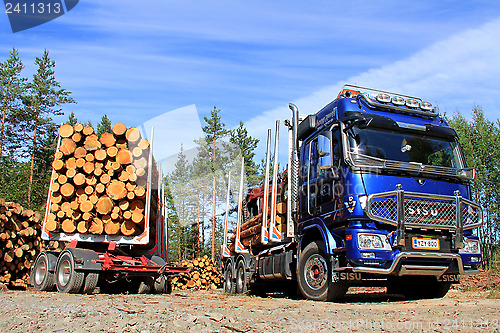 Image of Sisu Logging Truck and Trailer Full of Wood