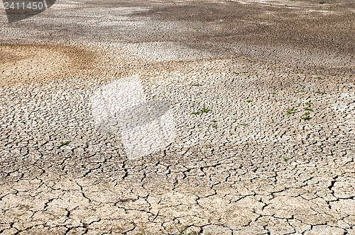 Image of black cracked waterless earth