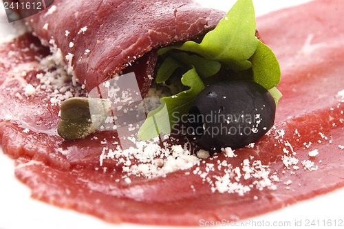 Image of Beef carpaccio with rucola and parmesan 