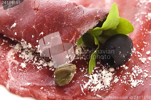 Image of Beef carpaccio with rucola and parmesan 