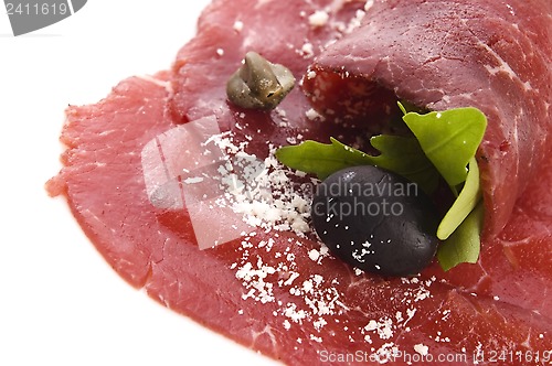 Image of Beef carpaccio with rucola and parmesan 